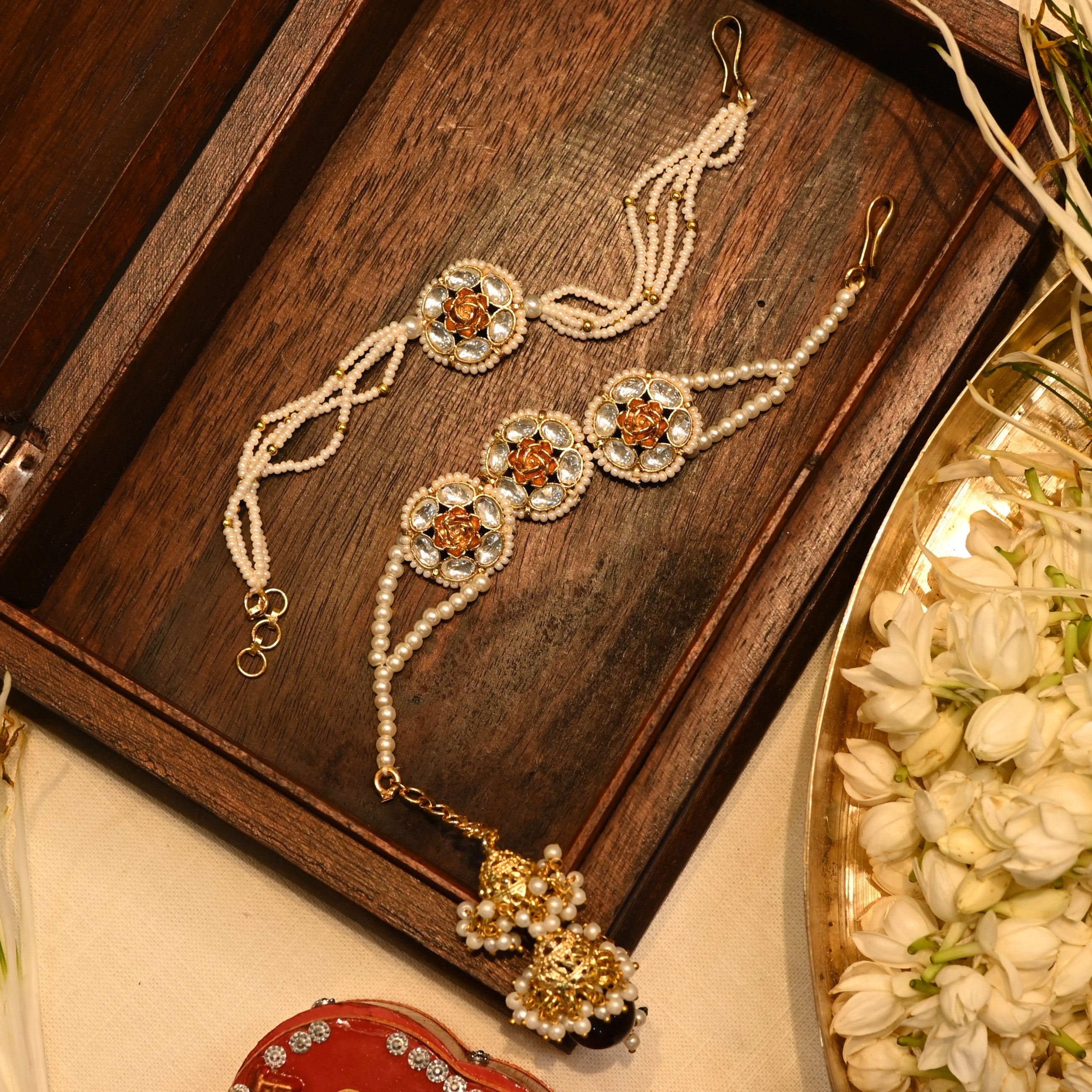 SJRB1013- White Colour Gold Plated Jadau Kundan Couple Flower Motif Rakhi