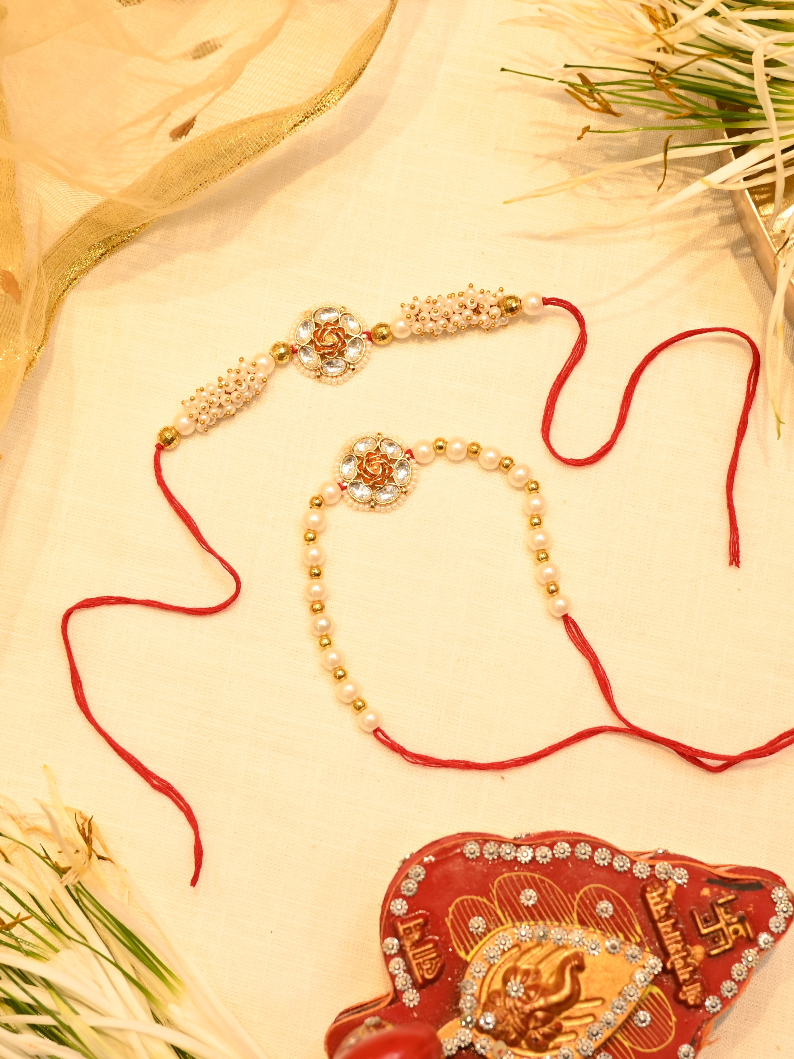 SJRB1012- White Colour Gold PLated Jadau Kundan Couple Flower Motif Rakhi