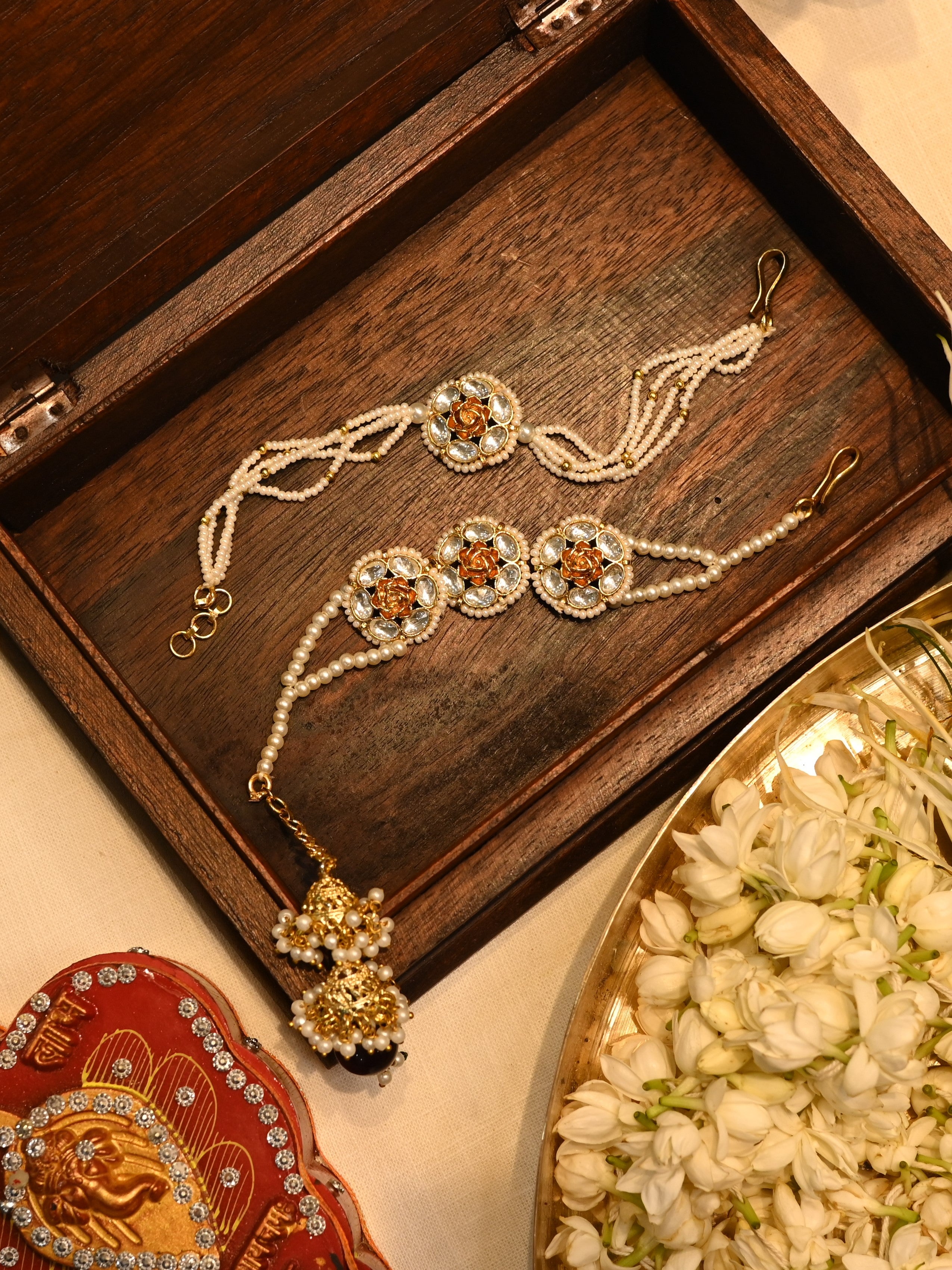 SJRB1013- White Colour Gold Plated Jadau Kundan Couple Flower Motif Rakhi