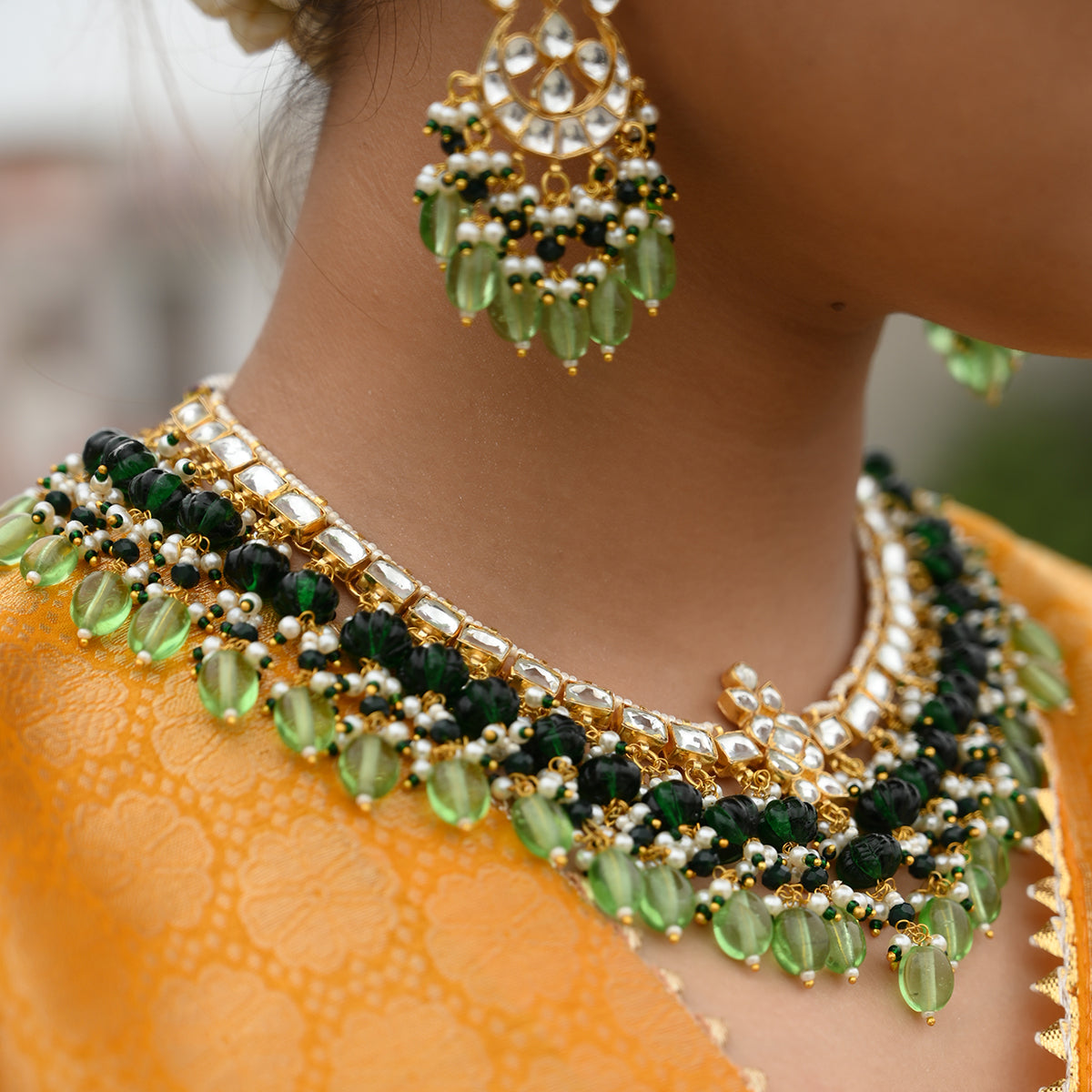 Baani Green Kundan Necklace Set with Tika