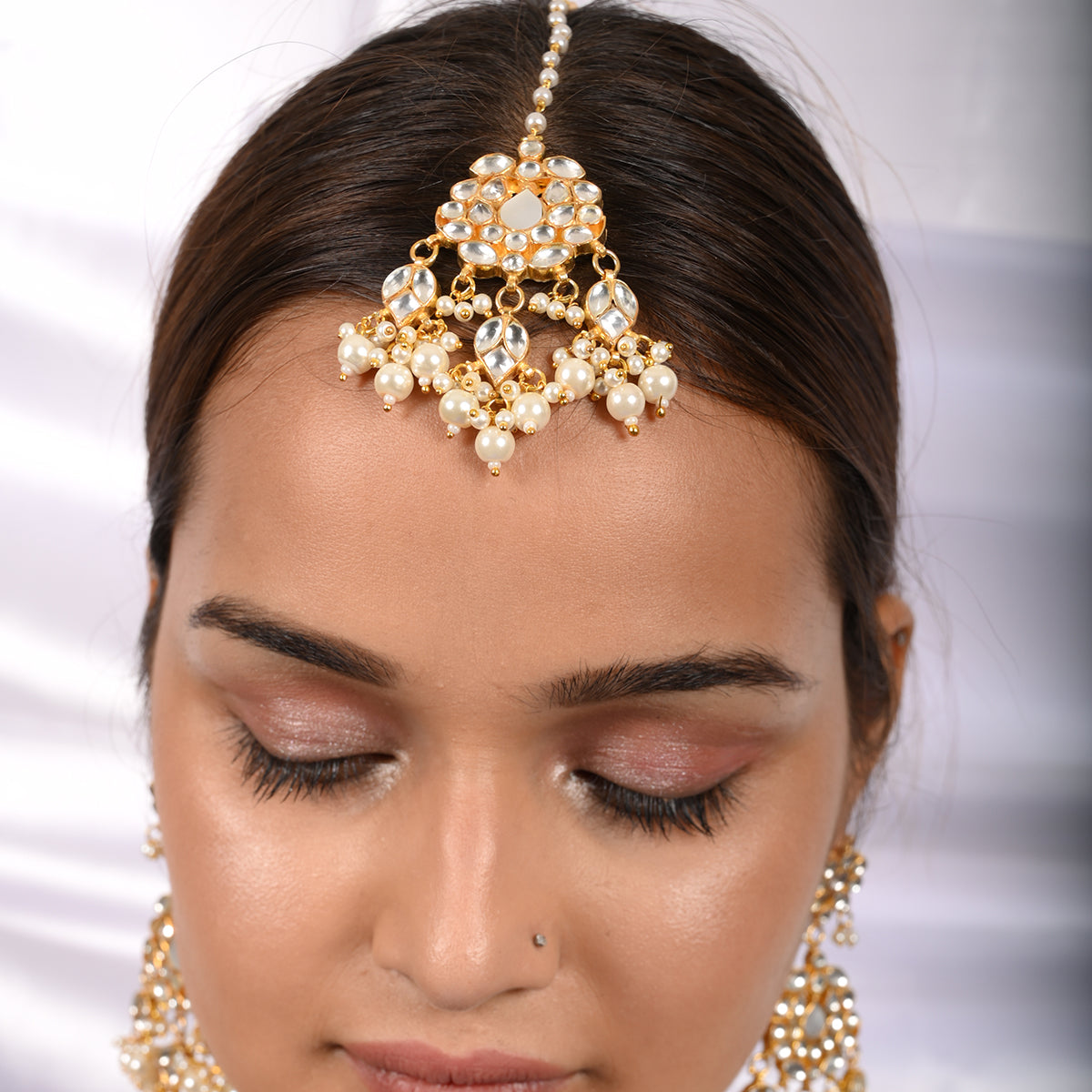 Vrishti Gold Plated Kundan Necklace With Earrings and Tika