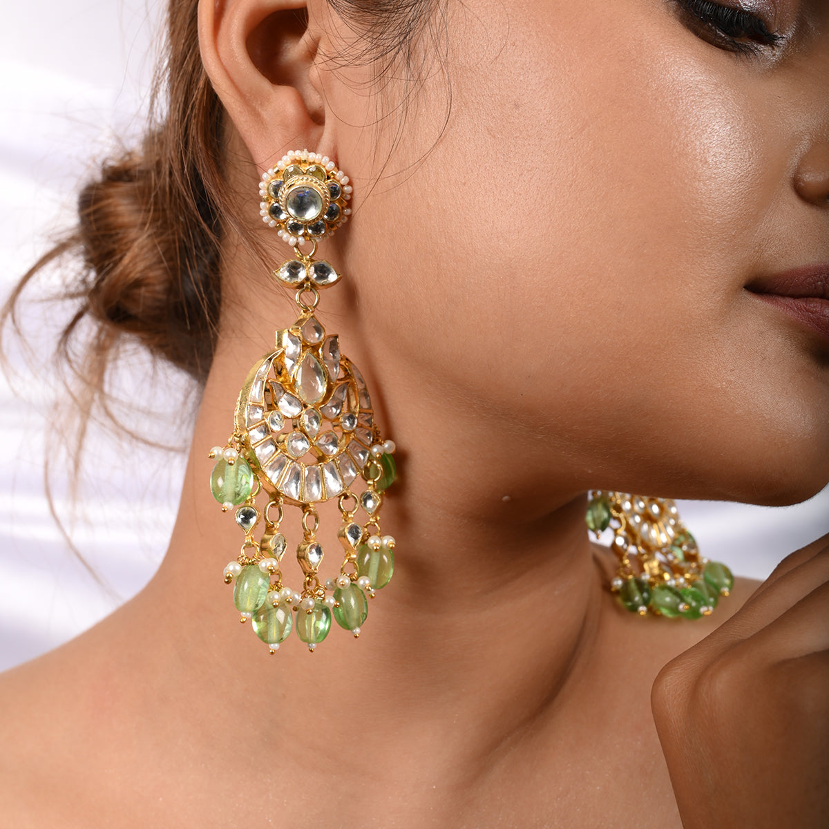 Kaushtubh Long Green Earrings
