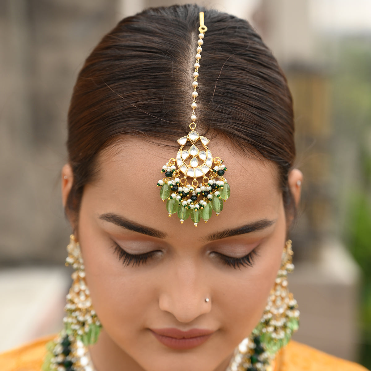 Baani Green Kundan Necklace Set with Tika
