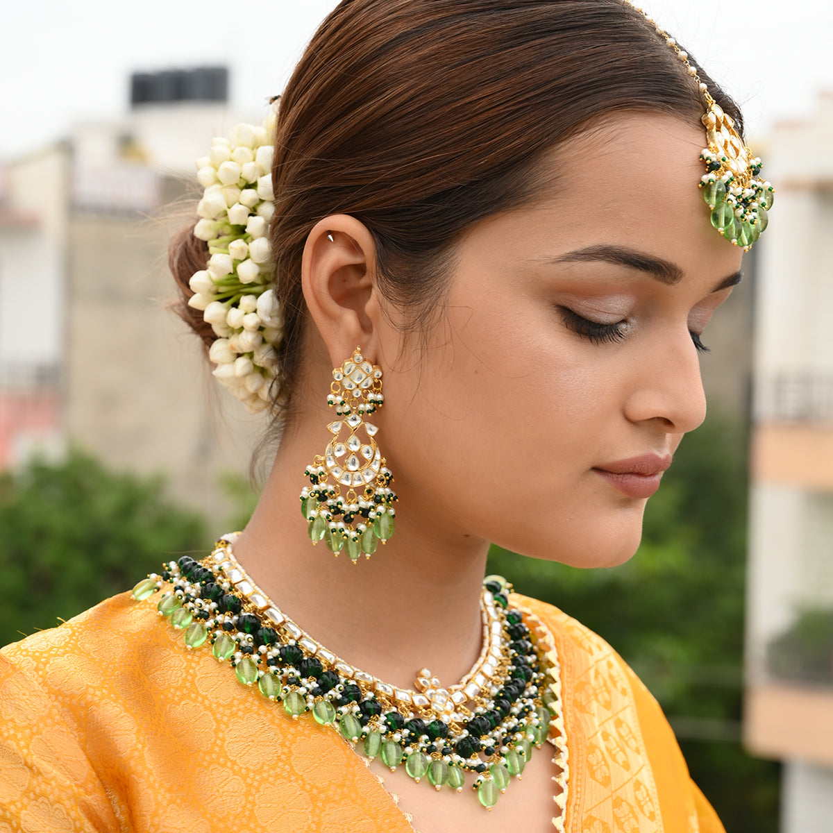 Baani Green Kundan Necklace Set with Tika