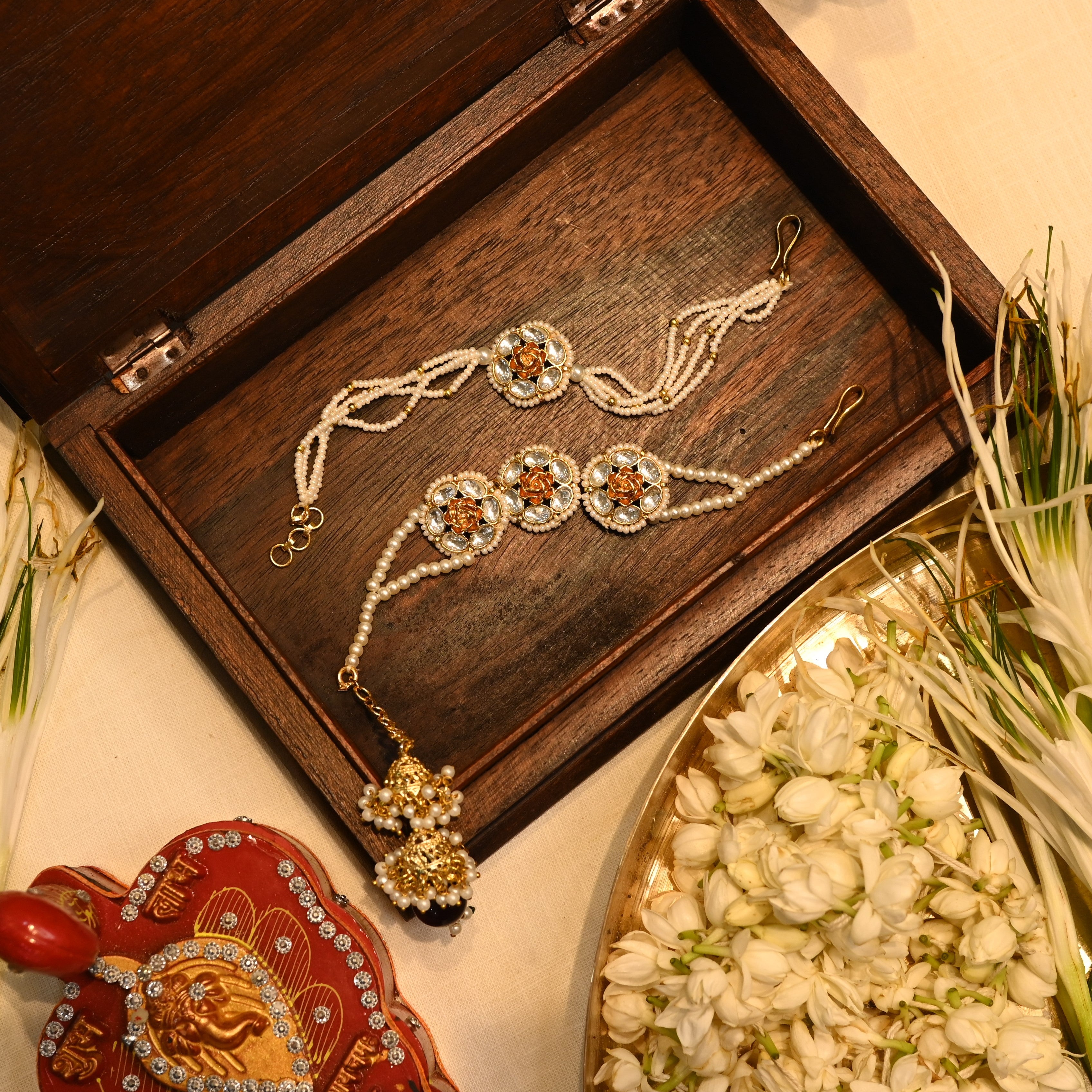 SJRB1013- White Colour Gold Plated Jadau Kundan Couple Flower Motif Rakhi
