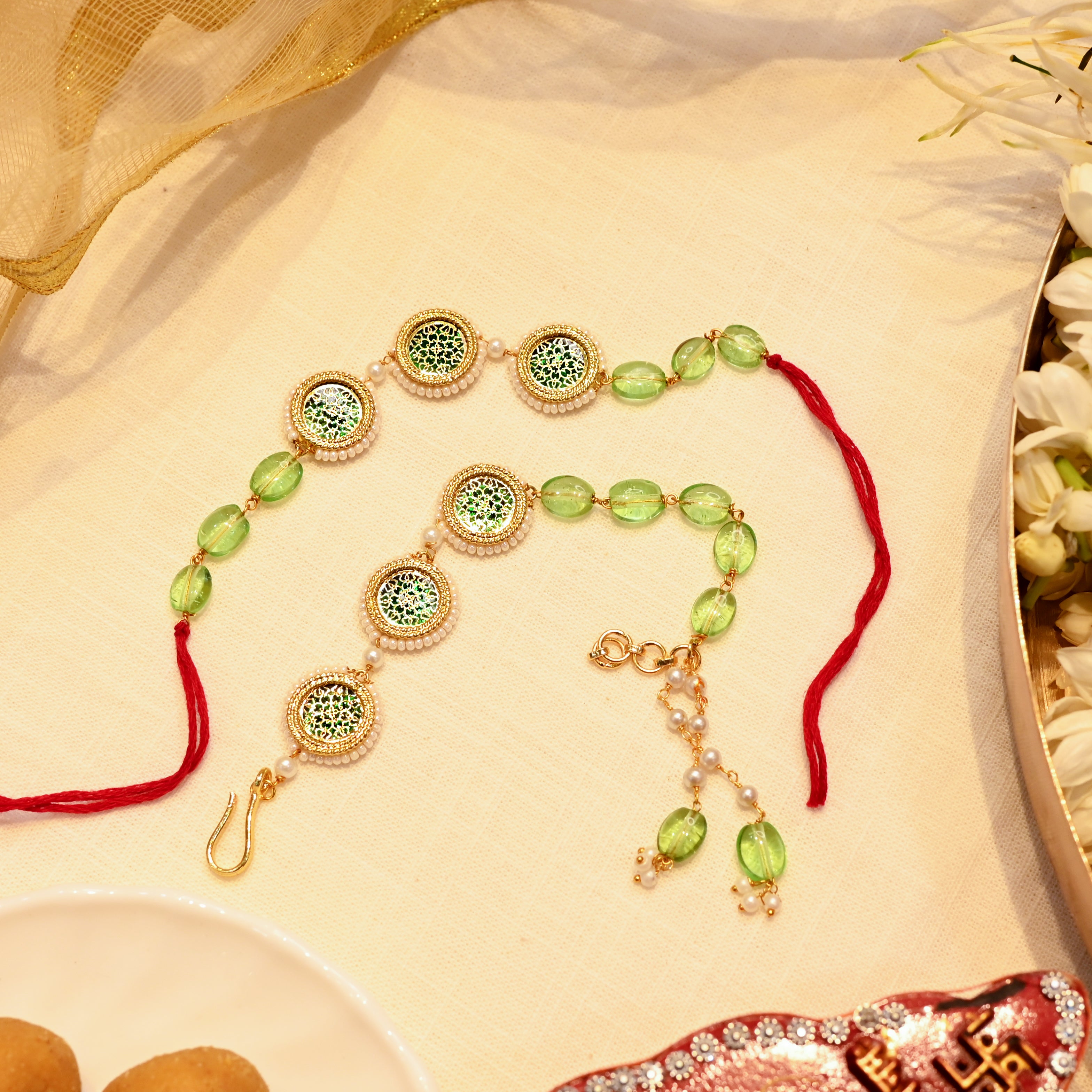SJRB1004- Green Colour Gold Plated Couple Beaded Rakhi