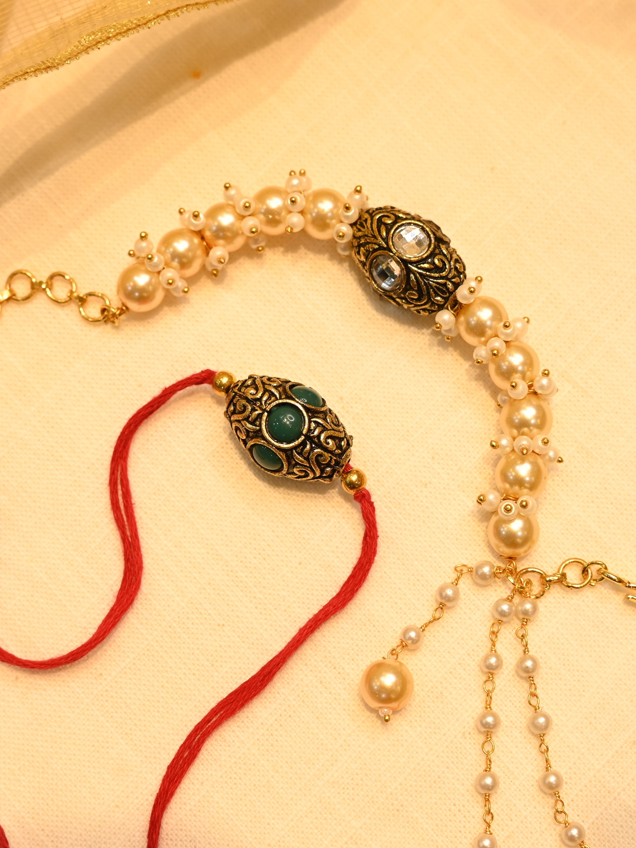 SJRB1007- White and Green Colour Gold Plated Beaded Couple Rakhi