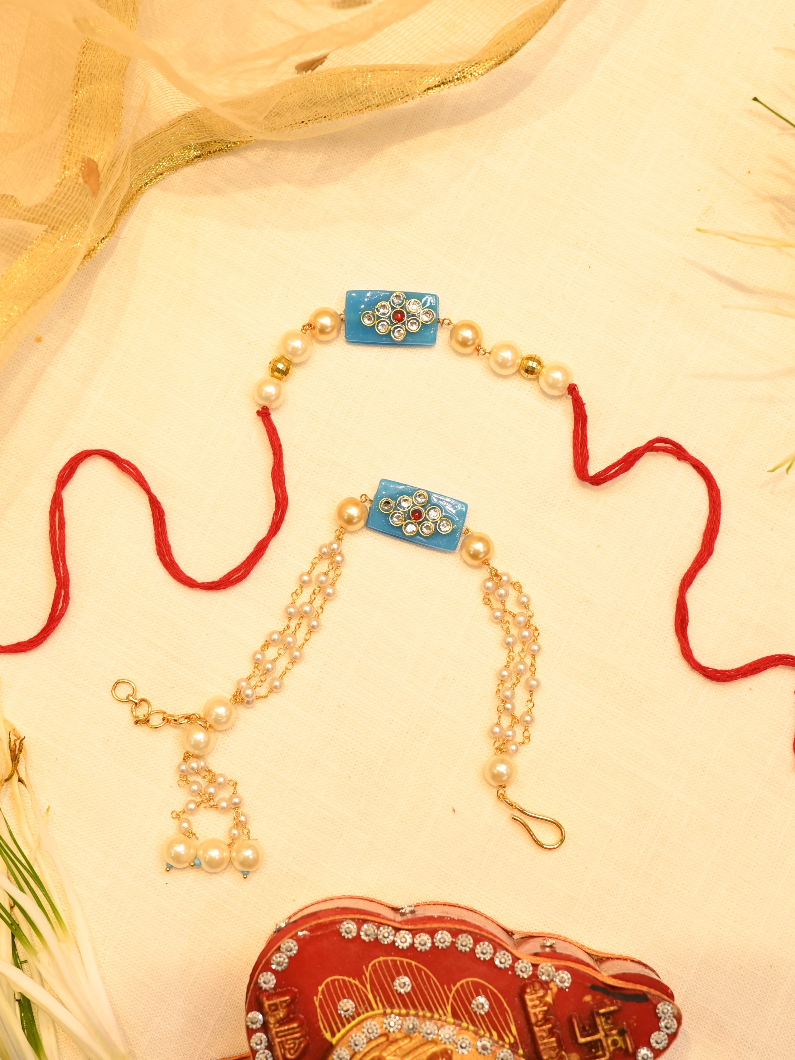 SJRB1010- Blue Colour Gold Plated Beaded Couple Rakhi