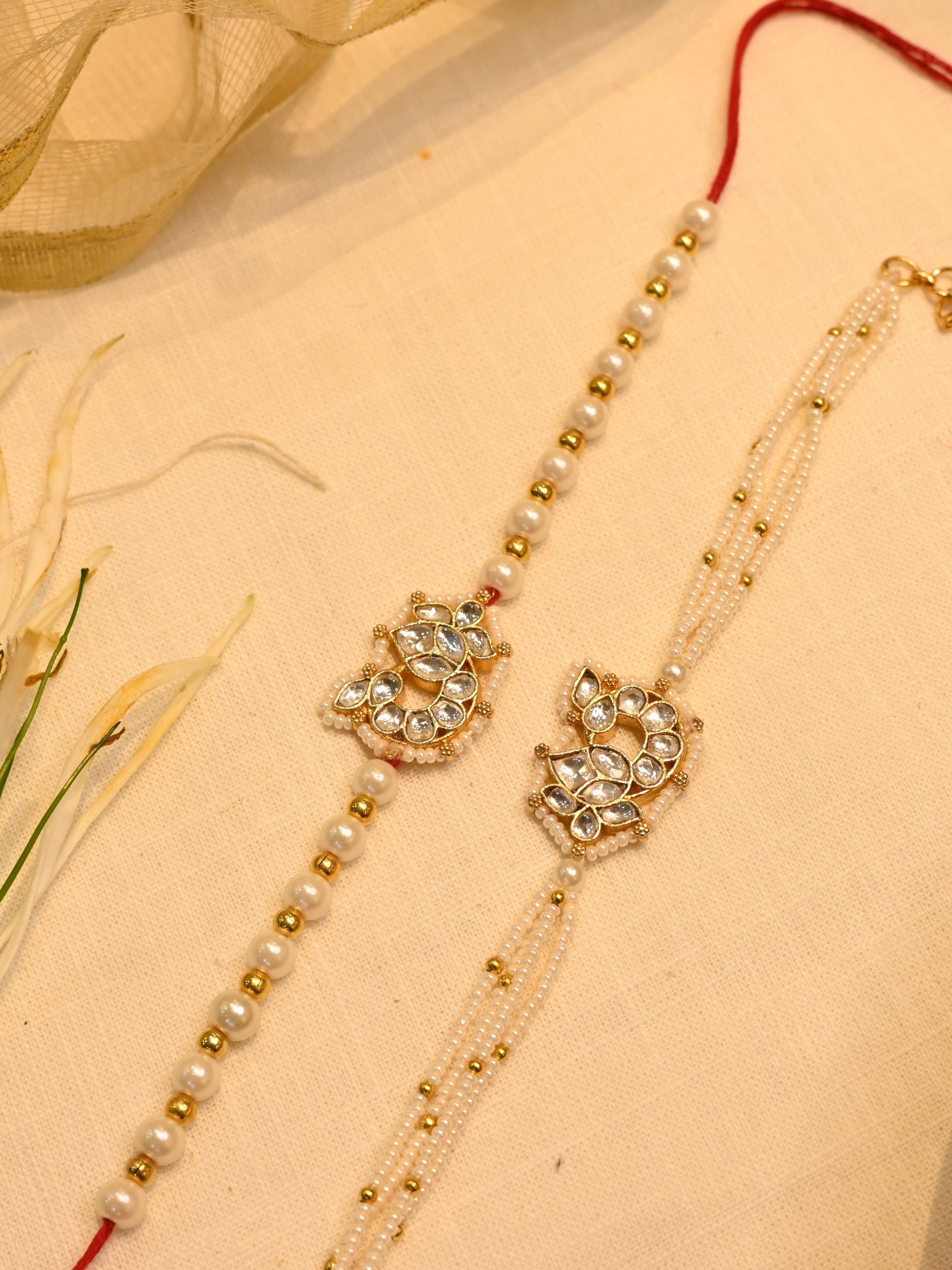 SJRB1005- White Colour Gold Plated Jadau Kundan Couple Peacock Motif Rakhi