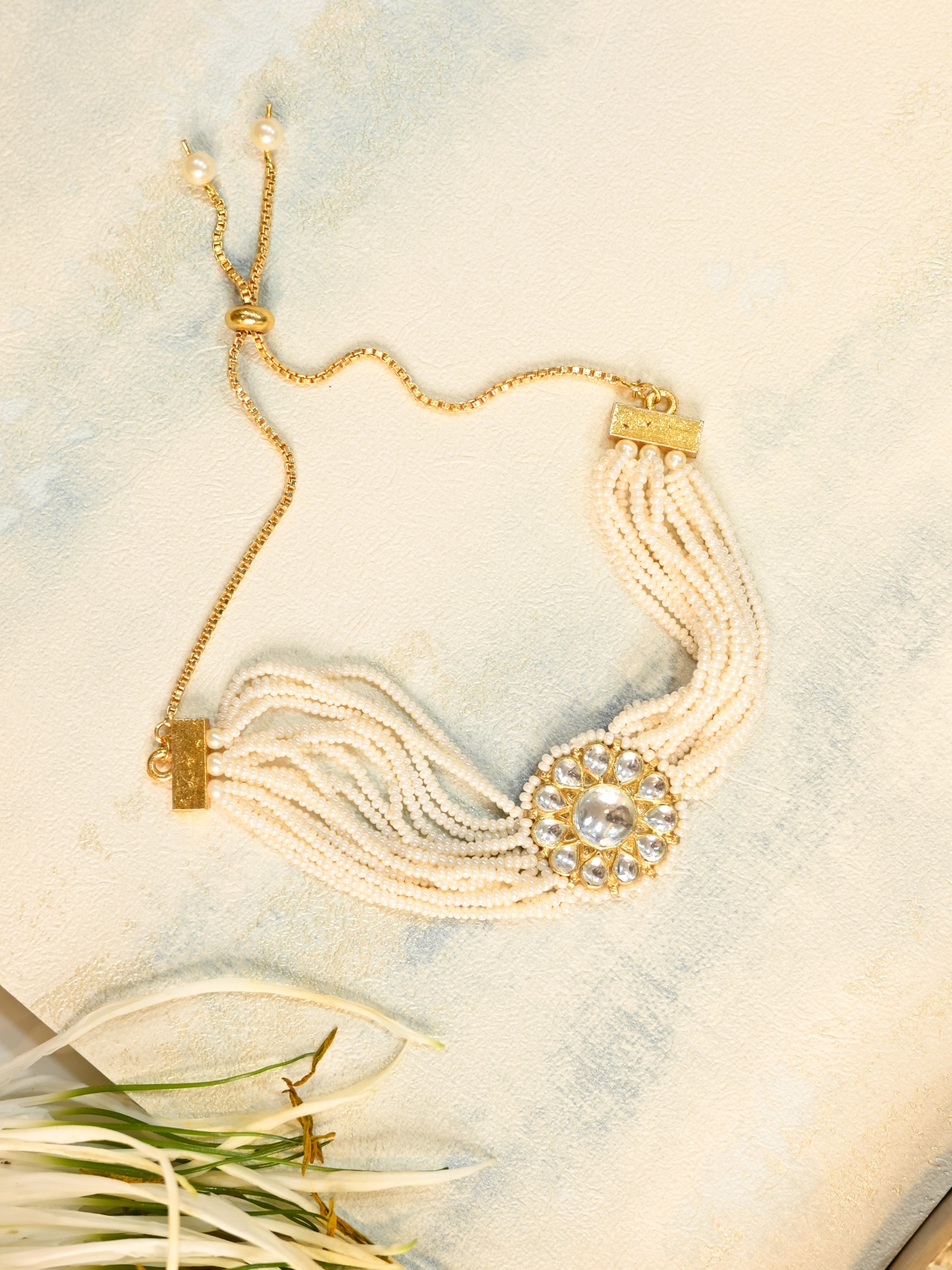 SJRB1016- White Colour Gold Plated Jadau Kundan Rakhi