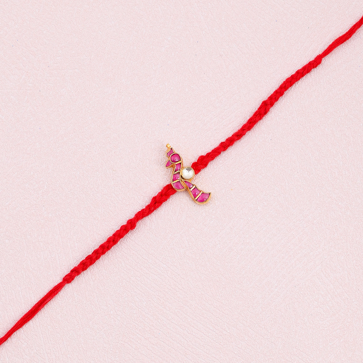 Prathith Gold Plated Pink Peacock Kundan Rakhi