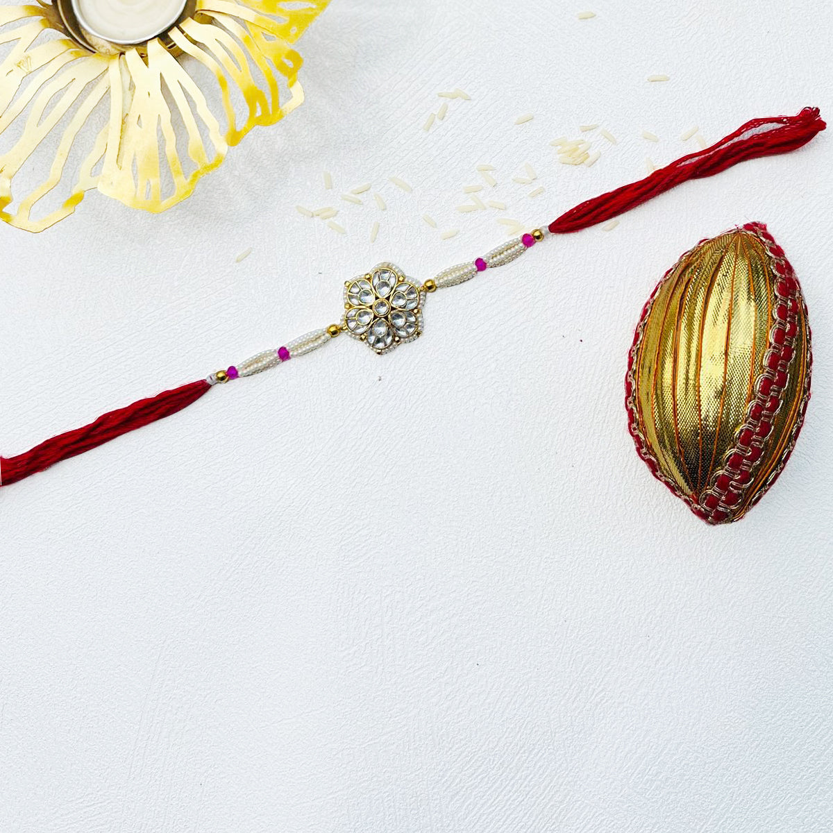 Niketam Gold Plated Jadau Kundan Rakhi