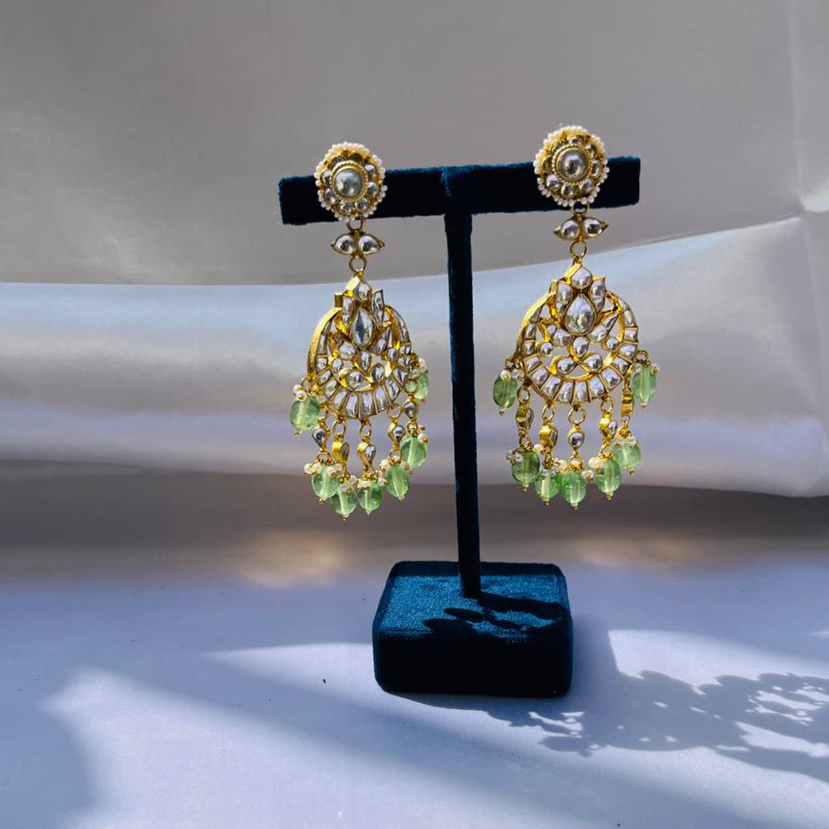 Kaushtubh Long Green Earrings